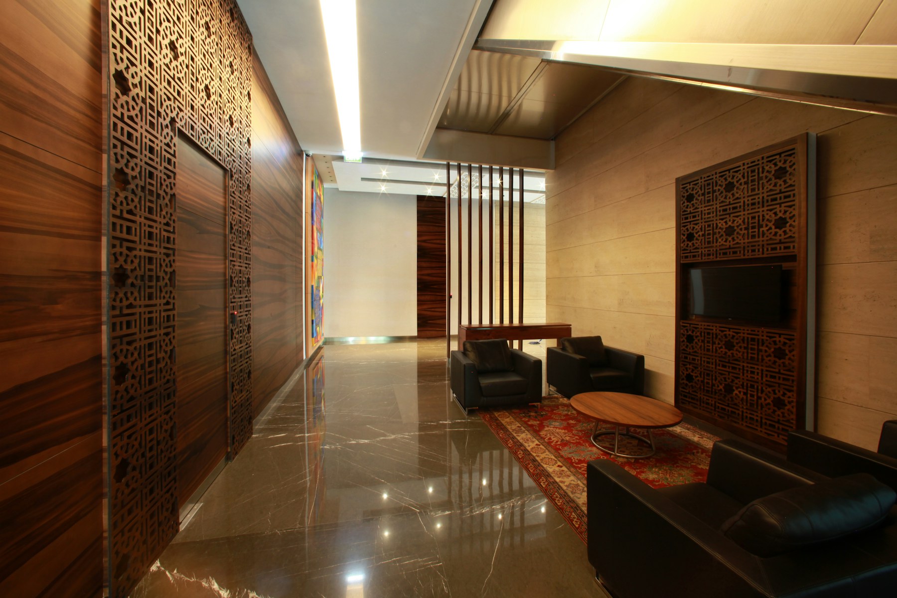 Premium private practice reception showing controlled professional handoff environment